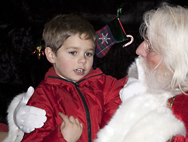 Child talking with Santa
